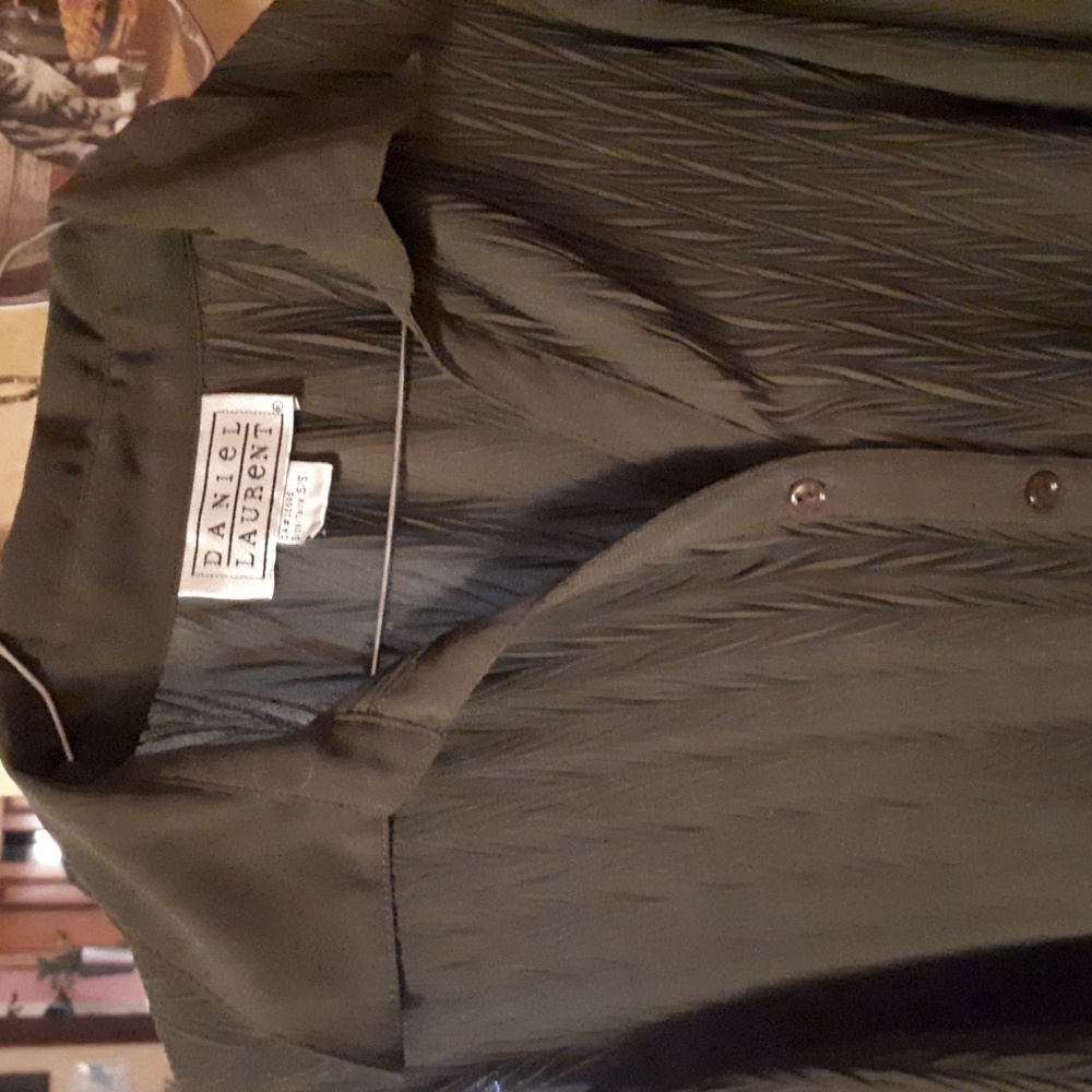 Ladies blouse, Daniel Laurent, 100% polyester. Made in Indonesia. Size small.